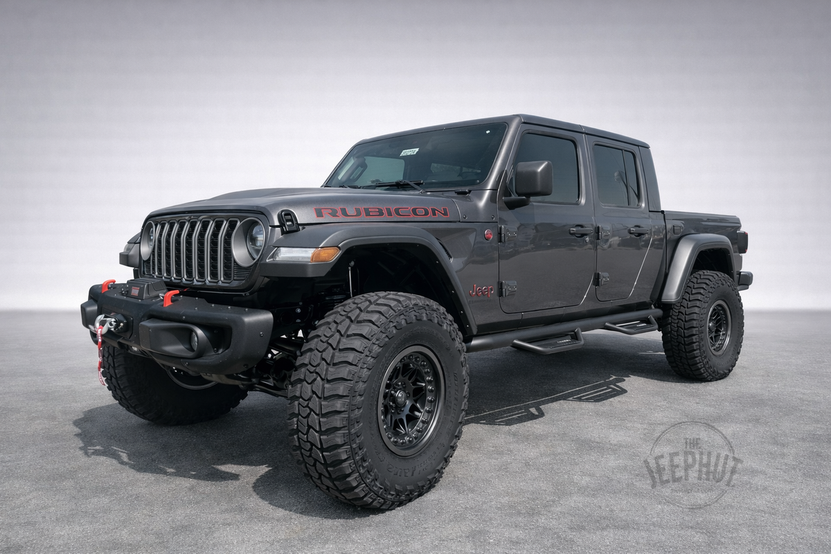 Gray 2025 Jeep Gladiator Rubicon Timber Ridge build with lifted suspension, 37-inch tires, black Black Rhino Alpha wheels, WARN winch and N-Fab steps