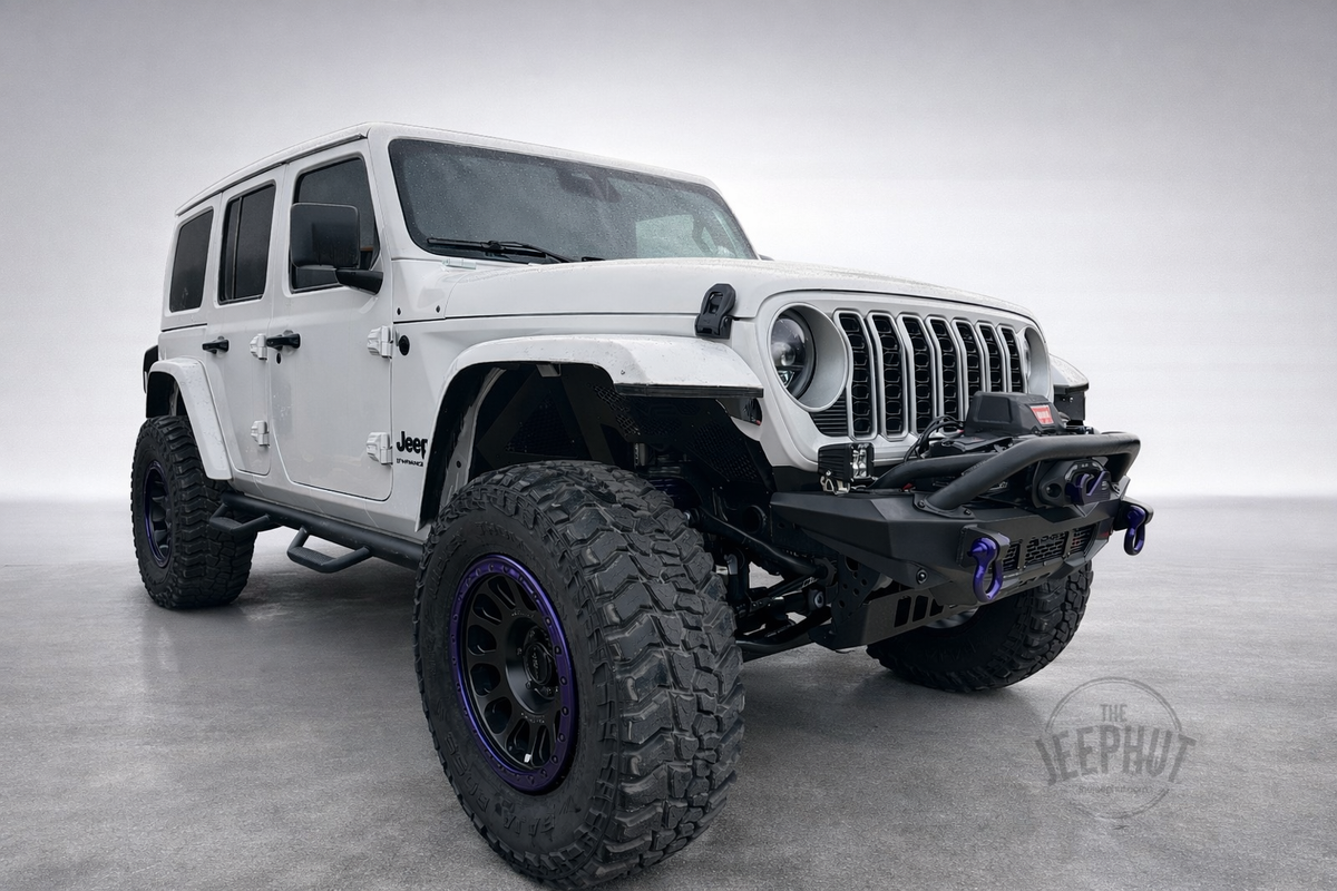 White 2025 Jeep Wrangler Sahara with custom purple accents, lifted suspension, Method wheels, DV8 front bumper and WARN winch