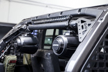 Load image into Gallery viewer, DV8 Offroad Light Mounts DV8 Offroad 18-23 Jeep Wrangler JL 4-Door Speaker/Light Bar Mount