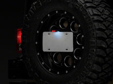 Load image into Gallery viewer, Raxiom Brake Lights Raxiom 07-18 Jeep Wrangler JK Axial Series License Plate Bracket w/ LED Brake Light