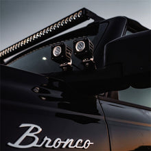 Load image into Gallery viewer, Rigid Industries Light Bars &amp; Cubes Rigid Industries Revolve Pod w/Amber Trim Ring - Pair