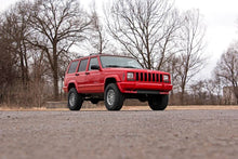 Load image into Gallery viewer, Rough Country Lift Kits Jeep Cherokee XJ 3 Inch Series II Suspension Lift Kit w/V2 Shocks Leaf Springs For 84-01 Jeep Cherokee XJ Rough Country - Rough Country - 630X70