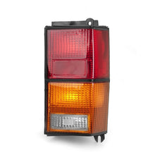 Load image into Gallery viewer, Omix Right Tail Lamp 84-96 Jeep Cherokee (XJ)